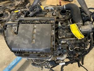 Engine from a Peugeot 208 I (CA/CC/CK/CL) 1.4 HDi 2013
