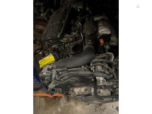 Engine from a Peugeot 208 I (CA/CC/CK/CL) 1.4 HDi 2013