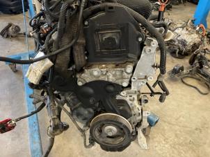 Engine from a Peugeot 208 I (CA/CC/CK/CL) 1.4 HDi 2013
