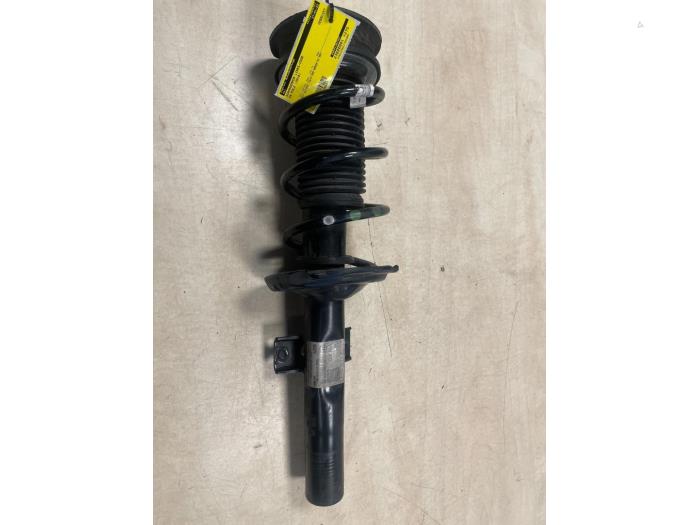 Fronts shock absorber, left from a Volkswagen Polo VI (AW1) 1.0 TSI 12V 2018