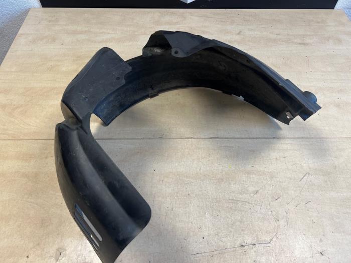Wheel arch liner from a Ford Fiesta 6 (JA8) 1.4 TDCi 2010