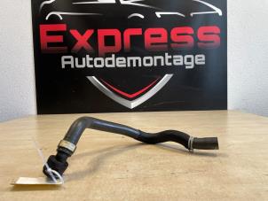 Used Radiator hose Peugeot 208 II (UB/UH/UP) 1.2 Vti 12V PureTech 75 Price € 33,88 Inclusive VAT offered by Express Autodemontage