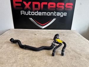 Used Radiator hose Peugeot 3008 II (M4/MC/MJ/MR) Price € 48,40 Inclusive VAT offered by Express Autodemontage