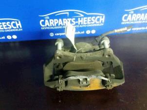 Used Front brake calliper, left Audi A4 (B8) 2.0 TFSI 16V Price on request offered by Carparts Heesch