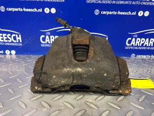 Used Front brake calliper, right Ford Focus 3 Wagon 1.6 TDCi 115 Price € 26,25 Margin scheme offered by Carparts Heesch