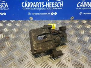 Used Rear brake calliper, left Ford Focus 3 Wagon 1.0 Ti-VCT EcoBoost 12V 125 Price € 26,25 Margin scheme offered by Carparts Heesch