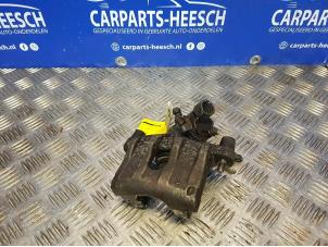 Used Rear brake calliper, right Ford Focus 3 Wagon 1.0 Ti-VCT EcoBoost 12V 125 Price € 26,25 Margin scheme offered by Carparts Heesch