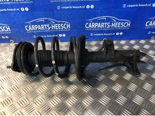 Used Fronts shock absorber, left Kia Cee'd (EDB5) 1.4 CVVT 16V Price € 47,25 Margin scheme offered by Carparts Heesch