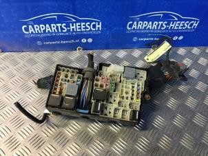 Używane Skrzynka bezpieczników Ford Focus 3 Wagon 1.6 TDCi 115 Cena € 42,00 Procedura marży oferowane przez Carparts Heesch