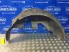 Wheel arch liner from a Ford Fiesta 6 (JA8), 2008 / 2017 1.0 Ti-VCT 12V 65, Hatchback, Petrol, 999cc, 48kW, FWD, XMJC, 2015-01 / 2017-06 2017