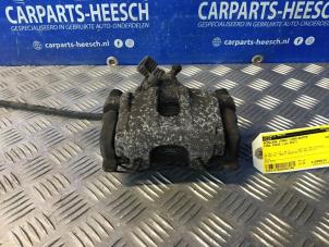 Used Rear brake calliper, left Ford Focus 3 Wagon 1.0 Ti-VCT EcoBoost 12V 100 Price € 26,25 Margin scheme offered by Carparts Heesch