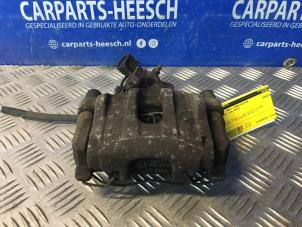 Used Rear brake calliper, left Ford Focus 3 Wagon Price € 26,25 Margin scheme offered by Carparts Heesch