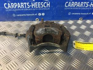 Used Front brake calliper, right Ford Fiesta 6 (JA8) 1.0 Ti-VCT 12V 65 Price € 26,25 Margin scheme offered by Carparts Heesch