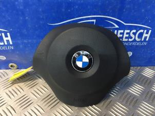 Używane Poduszka powietrzna lewa (kierownica) BMW 1 serie (E81) 116i 1.6 16V Cena € 52,50 Procedura marży oferowane przez Carparts Heesch
