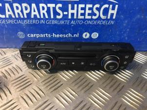 Used Heater control panel BMW 1 serie (E81) 118i 16V Price € 31,50 Margin scheme offered by Carparts Heesch