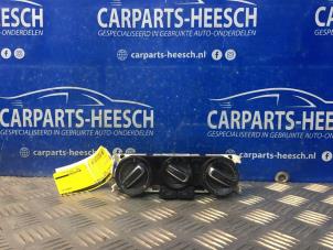 Usados Panel de control de calefacción Volkswagen Polo Precio € 26,25 Norma de margen ofrecido por Carparts Heesch
