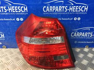 Used Taillight, left BMW 1 serie (E87/87N) 118i 16V Price € 31,50 Margin scheme offered by Carparts Heesch