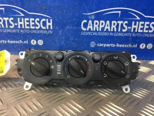 Używane Panel sterowania nagrzewnicy Ford Focus 3 Wagon 1.6 TDCi 115 Cena € 26,25 Procedura marży oferowane przez Carparts Heesch