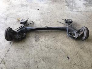 Used Rear-wheel drive axle Opel Corsa D 1.4 16V Twinport Price € 105,00 Margin scheme offered by Carparts Heesch
