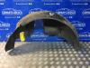 Wheel arch liner from a Opel Corsa D, 2006 / 2014 1.4 16V Twinport, Hatchback, Petrol, 1.364cc, 66kW (90pk), FWD, Z14XEP; EURO4, 2006-07 / 2014-08 2007