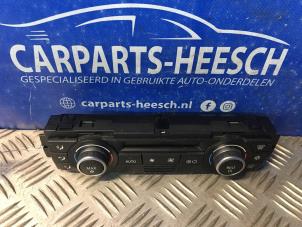 Used Heater control panel BMW 1 serie (E87/87N) 118i 16V Price € 31,50 Margin scheme offered by Carparts Heesch