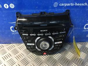 Used Radio control panel Ford B-Max (JK8) 1.0 EcoBoost 12V 100 Price € 78,75 Margin scheme offered by Carparts Heesch