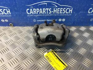 Used Rear brake calliper, left Opel Astra K 1.4 Turbo 16V Price € 52,50 Margin scheme offered by Carparts Heesch