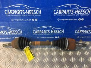 Used Front drive shaft, left Ford Focus 3 Wagon Price € 78,75 Margin scheme offered by Carparts Heesch