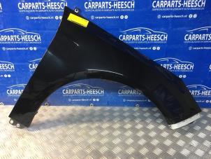 Używane Blotnik prawy przód Ford Focus 3 Wagon Cena na żądanie oferowane przez Carparts Heesch