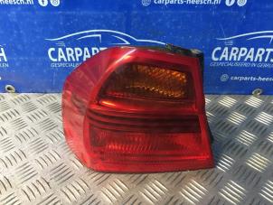 Used Taillight, left BMW 3 serie (E90) 318i 16V Price € 31,50 Margin scheme offered by Carparts Heesch