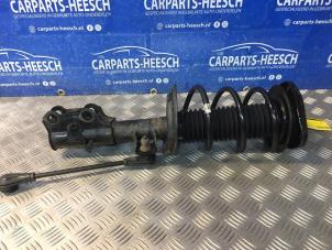Used Fronts shock absorber, left Ford Focus 4 1.0 Ti-VCT EcoBoost 12V 125 Price € 150,00 Margin scheme offered by Carparts Heesch