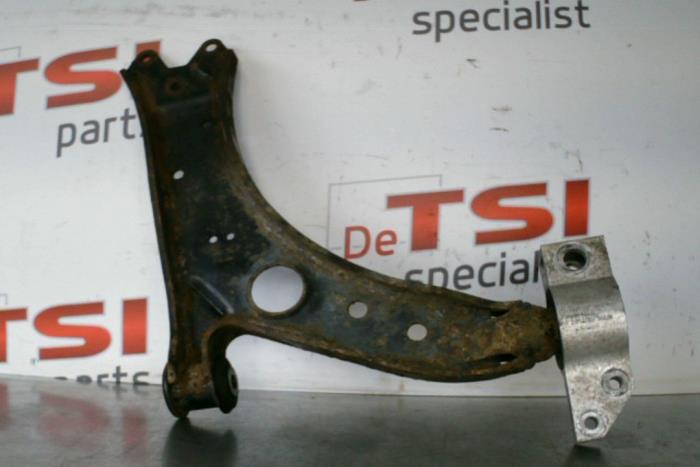 Front upper wishbone, left from a Volkswagen Caddy 2006