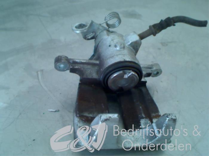 Rear brake calliper, left from a Volkswagen Transporter T5 2.5 TDi 2004