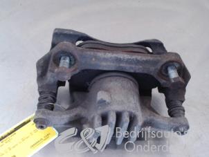 Used Front brake calliper, right Nissan NV 300 1.6 dCi 125 Price € 47,25 Margin scheme offered by C&J bedrijfsauto's & onderdelen
