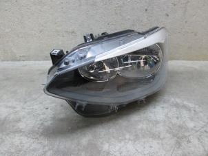 Używane Reflektor lewy BMW 1 serie (F20) Cena € 114,95 Z VAT oferowane przez NNP Automotive Group