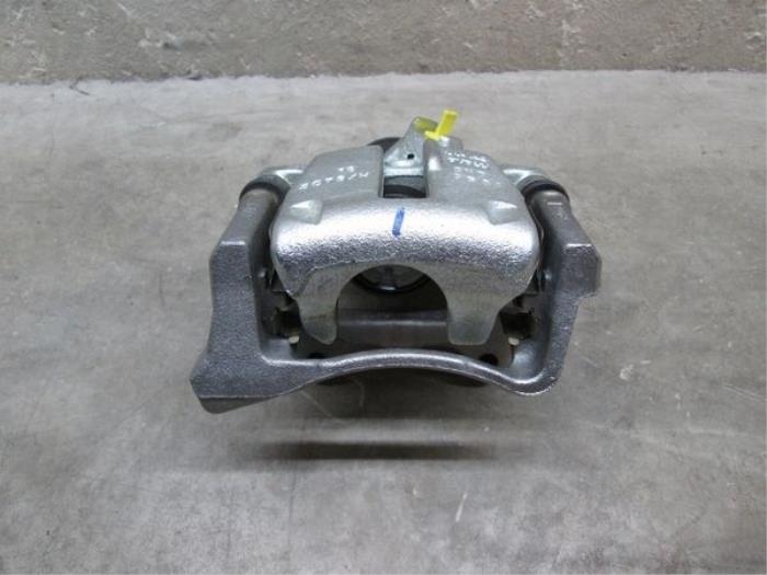 Rear brake calliper, left from a Volkswagen Passat Variant (365)  2012