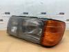 Headlight, left from a Mercedes-Benz S (W126) 420 SE,SEL 1989