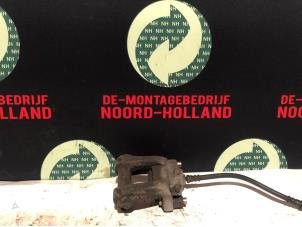 Usagé Etrier de frein (pince) arrière gauche BMW 1-Serie Prix € 15,00 Règlement à la marge proposé par Demontagebedrijf Noord-Holland
