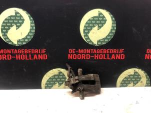 Usagé Etrier de frein (pince) arrière gauche Opel Astra Prix € 25,00 Règlement à la marge proposé par Demontagebedrijf Noord-Holland