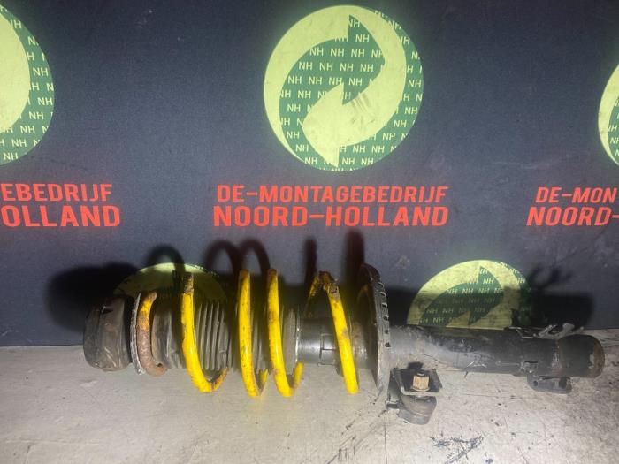 Fronts shock absorber, left from a Volkswagen Polo 2011