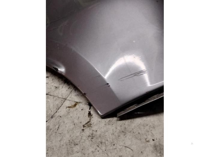 Rear bumper corner, left from a Renault Clio 2014