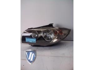 Used Headlight, left BMW 1 serie (E87/87N) 118i 16V Price € 90,75 Inclusive VAT offered by Vollux Carparts B.V.