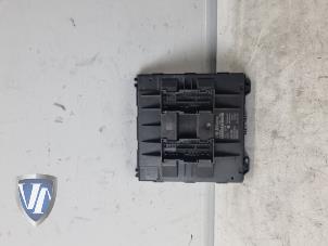 BordSteuergerät van een Volkswagen Polo V (6R) 1.2 TDI 12V BlueMotion 2009