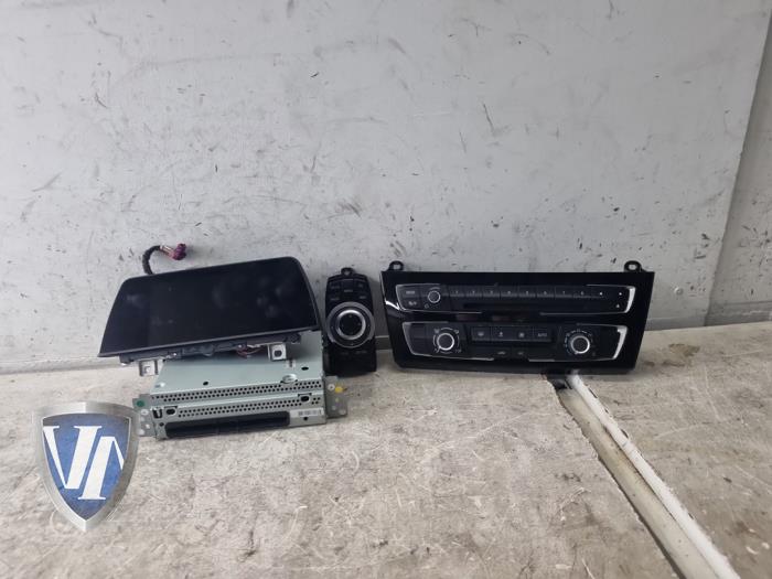 Gebrauchte Navigation Set BMW 1 serie (F20) 116d 1.5 12V TwinPower Preis € 605,00 Mit Mehrwertsteuer angeboten von Vollux Carparts B.V.