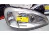 Headlight, right from a Opel Corsa 2000