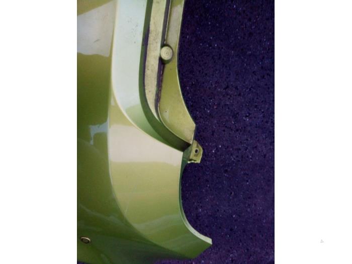 Parachoques trasero de un Chevrolet Spark (M300) 1.0 16V Bifuel 2011