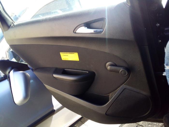 Rear door trim 4-door, left from a Opel Astra J (PC6/PD6/PE6/PF6) 1.3 CDTI 16V EcoFlex 2012