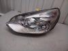 Headlight, left from a Ford S-Max (GBW) 2.0 16V 2006