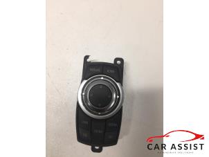 Used I-Drive knob BMW 1-Serie Price on request offered by Car Assist