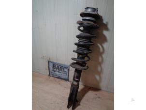 Used Fronts shock absorber, left Daihatsu Cuore (L251/271/276) 1.0 12V DVVT Price € 45,00 Margin scheme offered by Autorecycling Bart
